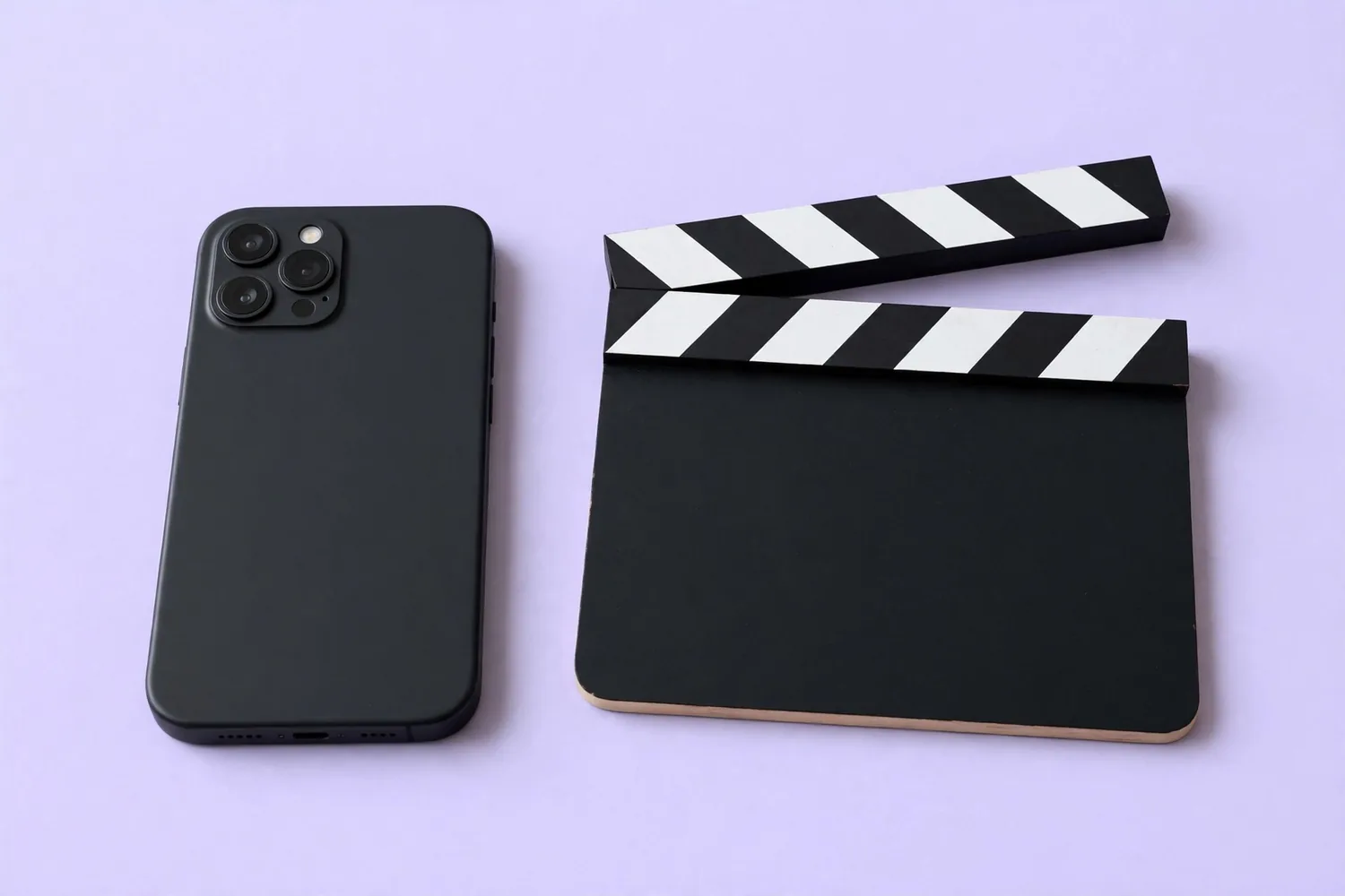 A phone beside a clapperboard